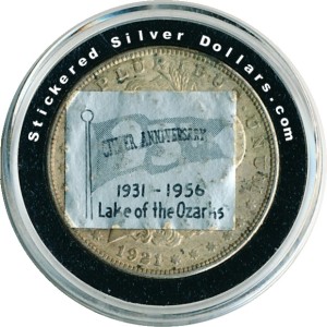 1931 - 1956 Lake of The Ozarks Silver Anniversary Stickered Morgan Dollar.